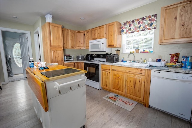 1889 Cobblestone Rd, Sulphur, OK 73086 - kitchen featuring white appliances, plenty of natural light, a sink, and light countertops
