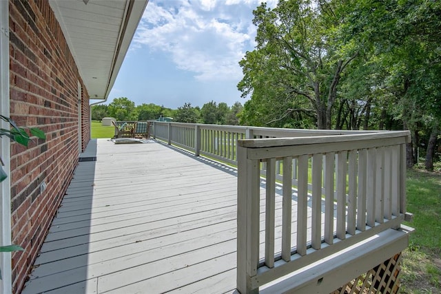 1889 Cobblestone Rd, Sulphur, OK 73086 - wooden deck featuring view of scattered trees