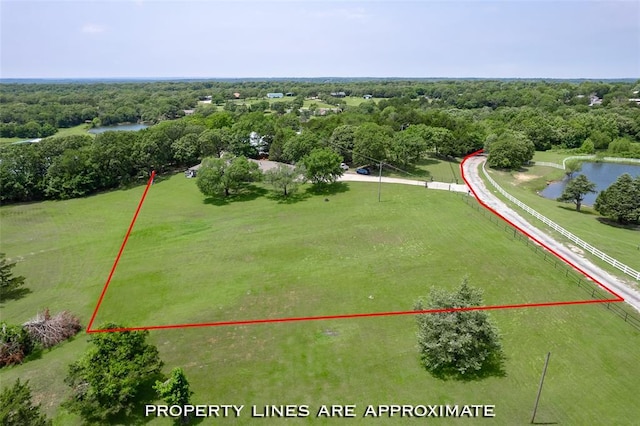 1889 Cobblestone Rd, Sulphur, OK 73086 - drone / aerial view of a large body of water and a heavily wooded area