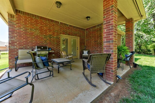 13009 Jasmine Ln, Oklahoma City, OK 73142 - view of patio / terrace with french doors