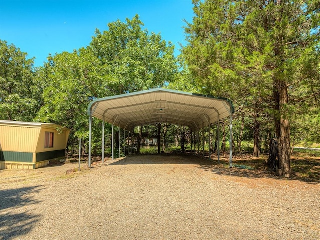 332 Royal Ln, Canadian, OK 74425 - view of parking with a carport