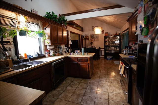 11332 Cimarron Dr, Oklahoma City, OK 73162 - kitchen featuring black appliances, a sink, vaulted ceiling, light countertops, and a peninsula
