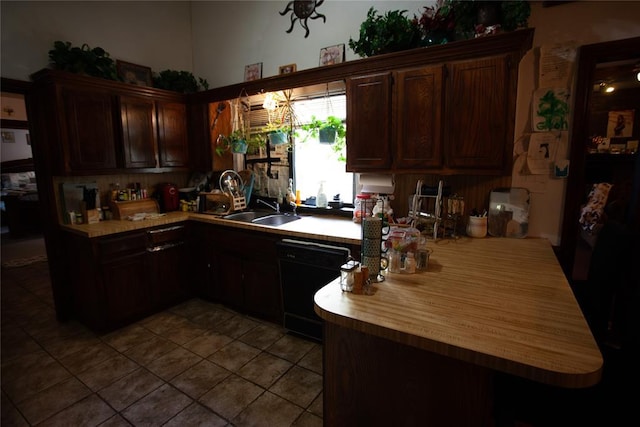 11332 Cimarron Dr, Oklahoma City, OK 73162 - kitchen with dishwasher, a sink, light countertops, dark brown cabinets, and tile patterned flooring