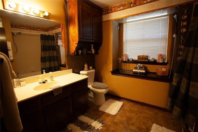11332 Cimarron Dr, Oklahoma City, OK 73162 - full bath featuring toilet, vanity, a shower with curtain, and tile patterned flooring