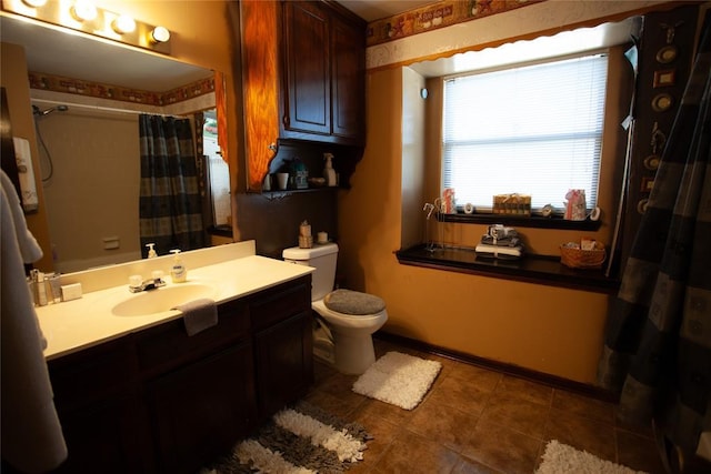 11332 Cimarron Dr, Oklahoma City, OK 73162 - bathroom featuring toilet, vanity, a shower with shower curtain, and tile patterned flooring