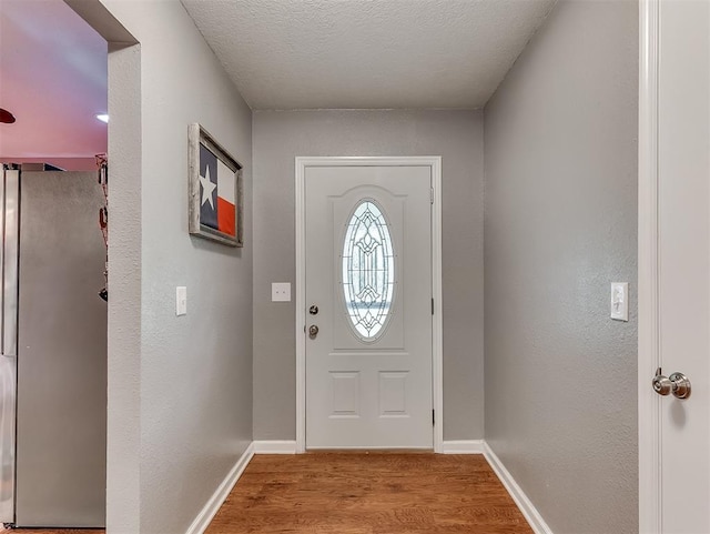12601 Rock Springs Rd, Jones, OK 73049 - foyer with wood finished floors and baseboards