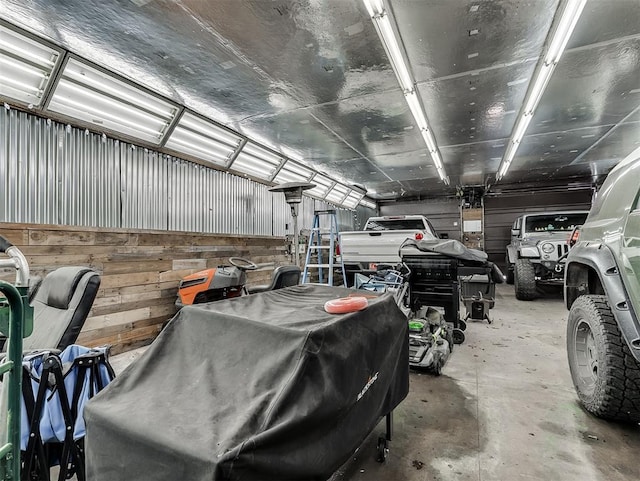 12601 Rock Springs Rd, Jones, OK 73049 - garage featuring wooden walls