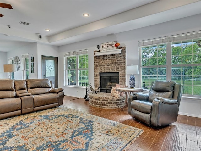 20486 Cypress Way, Tecumseh, OK 74873 - living room with wood finished floors, a fireplace, recessed lighting, baseboards, and ceiling fan