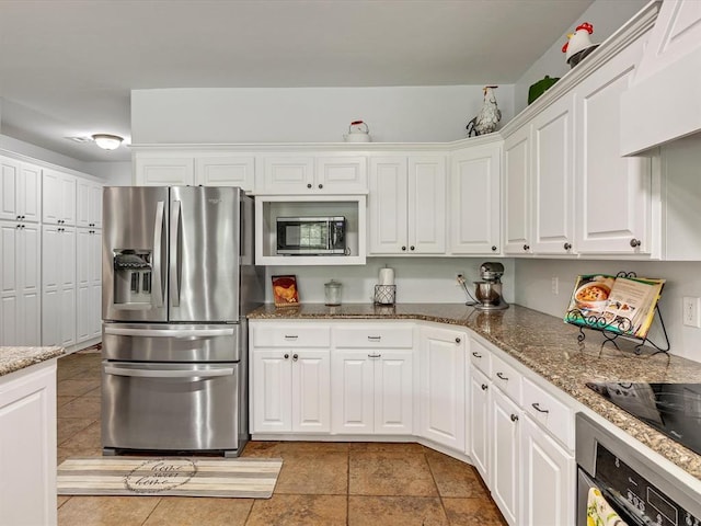 20486 Cypress Way, Tecumseh, OK 74873 - kitchen featuring appliances with stainless steel finishes, white cabinets, and stone countertops