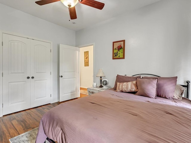 20486 Cypress Way, Tecumseh, OK 74873 - bedroom featuring wood finished floors, a closet, and a ceiling fan
