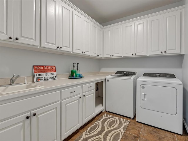 20486 Cypress Way, Tecumseh, OK 74873 - laundry area with independent washer and dryer, cabinet space, and dark stone finish floors