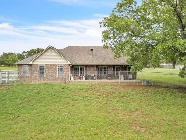 20486 Cypress Way, Tecumseh, OK 74873 - rear view of house featuring brick siding and a shingled roof