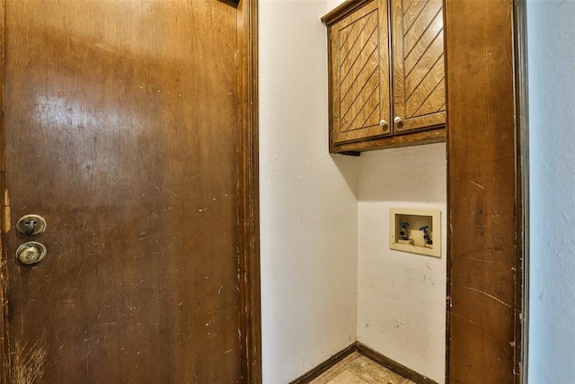 1101 S English St, Moore, OK 73160 - laundry area featuring cabinet space, washer hookup, and baseboards