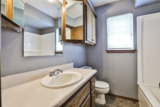 1101 S English St, Moore, OK 73160 - bathroom with toilet, baseboards, and vanity