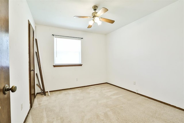 1101 S English St, Moore, OK 73160 - unfurnished bedroom featuring carpet, baseboards, and a ceiling fan