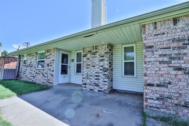 1101 S English St, Moore, OK 73160 - view of patio / terrace featuring central AC unit
