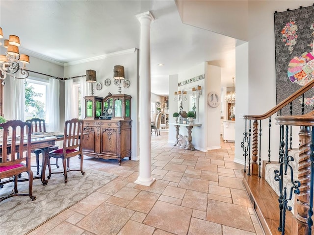 512 E Prairie Grove Rd, Guthrie, OK 73044 - dining room featuring stone tile flooring, decorative columns, baseboards, a chandelier, and ornamental molding