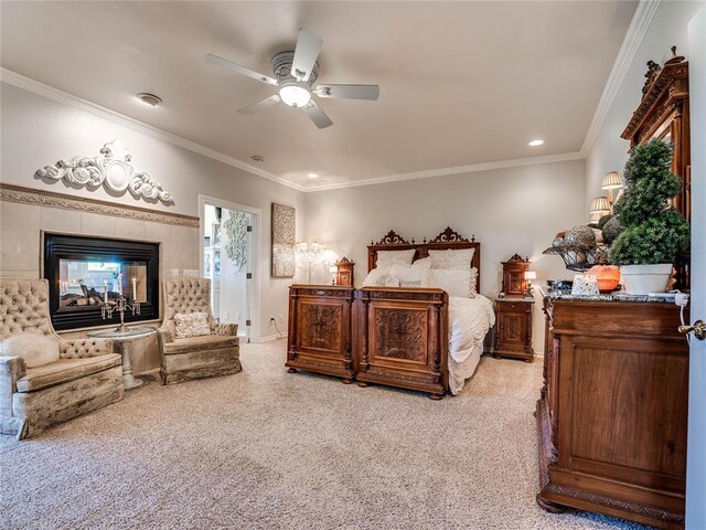 512 E Prairie Grove Rd, Guthrie, OK 73044 - bedroom with light colored carpet, ornamental molding, a tiled fireplace, recessed lighting, and ceiling fan