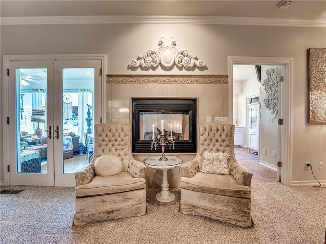 512 E Prairie Grove Rd, Guthrie, OK 73044 - living area with french doors, carpet flooring, crown molding, healthy amount of natural light, and baseboards