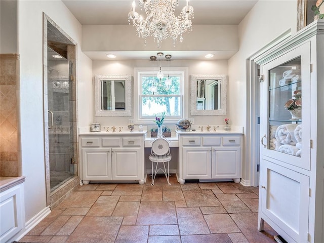 512 E Prairie Grove Rd, Guthrie, OK 73044 - full bath with vanity, a shower stall, a chandelier, and stone tile flooring