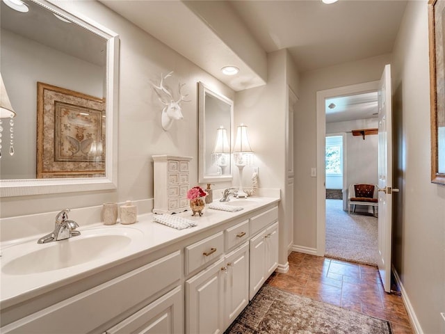 512 E Prairie Grove Rd, Guthrie, OK 73044 - full bathroom with double vanity and baseboards