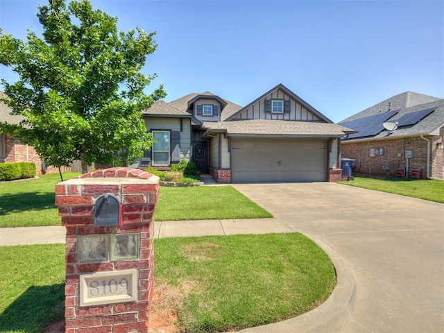 8109 NW 160th Ter, Edmond, OK 73013 - craftsman house with board and batten siding, an attached garage, concrete driveway, a front lawn, and brick siding