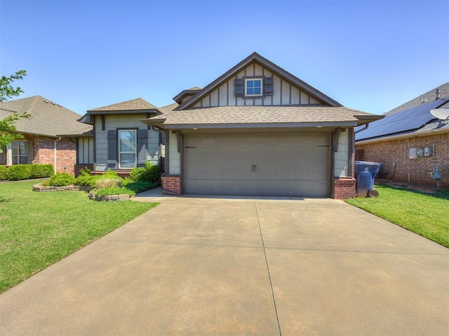 8109 NW 160th Ter, Edmond, OK 73013 - view of front facade with brick siding, concrete driveway, a front yard, an attached garage, and board and batten siding