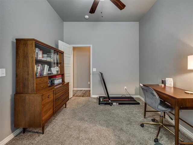 8109 NW 160th Ter, Edmond, OK 73013 - carpeted home office with a ceiling fan and baseboards