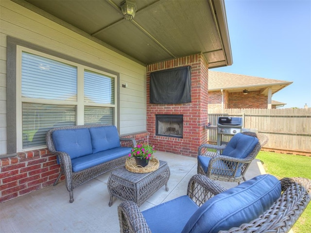 8109 NW 160th Ter, Edmond, OK 73013 - view of patio featuring an outdoor living space with a fireplace
