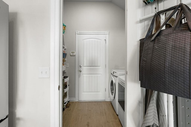 3409 Ontario Cir, Oklahoma City, OK 73160 - washroom featuring washing machine and dryer and light wood finished floors