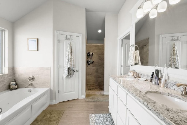 3409 Ontario Cir, Oklahoma City, OK 73160 - full bath featuring tiled shower, a tub with jets, double vanity, and baseboards
