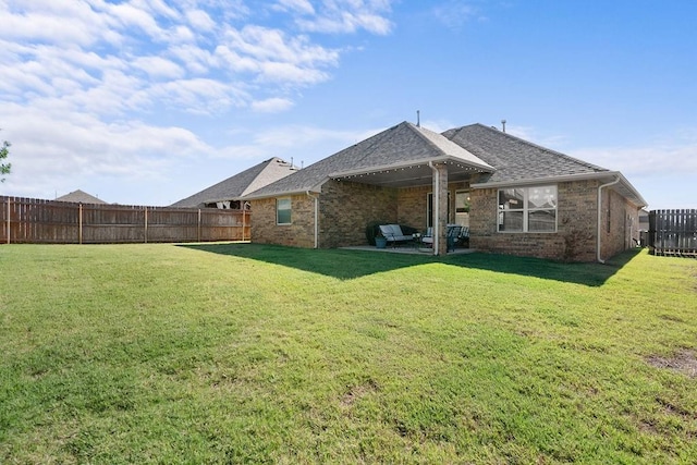 3409 Ontario Cir, Oklahoma City, OK 73160 - rear view of house with brick siding and a shingled roof