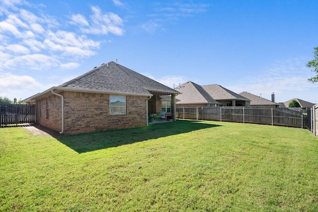 3409 Ontario Cir, Oklahoma City, OK 73160 - rear view of property featuring brick siding and roof with shingles
