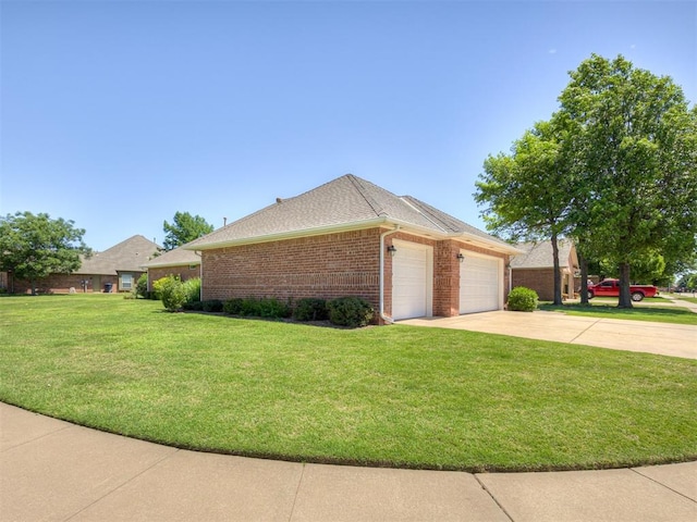 8413 NW 64th Ter, Oklahoma City, OK 73132 - view of property exterior featuring a lawn, brick siding, an attached garage, and concrete driveway