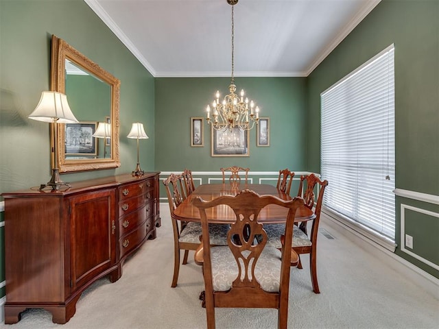 8413 NW 64th Ter, Oklahoma City, OK 73132 - dining space featuring light colored carpet, a chandelier, plenty of natural light, and ornamental molding
