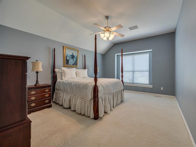 8413 NW 64th Ter, Oklahoma City, OK 73132 - bedroom with light colored carpet, vaulted ceiling, baseboards, and a ceiling fan