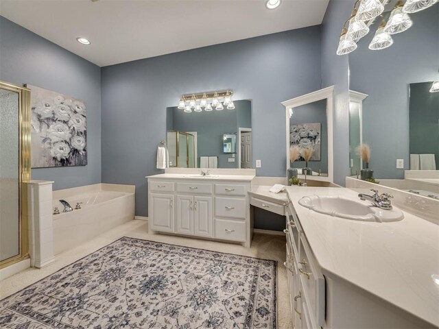 8413 NW 64th Ter, Oklahoma City, OK 73132 - full bathroom with a shower stall, a garden tub, two vanities, and baseboards