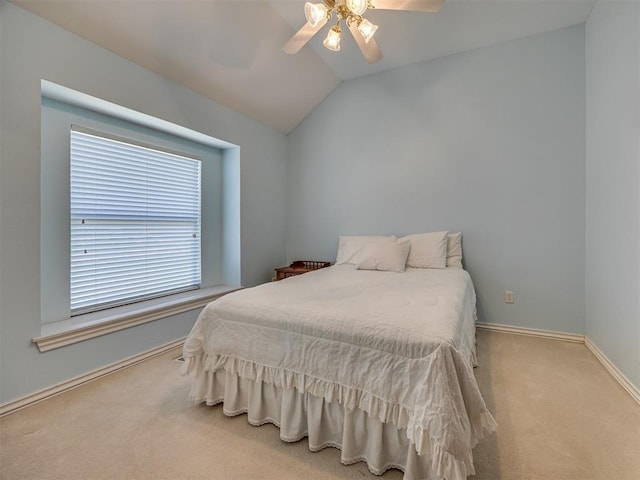 8413 NW 64th Ter, Oklahoma City, OK 73132 - carpeted bedroom featuring baseboards, vaulted ceiling, and ceiling fan
