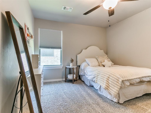 9212 NW 89th St, Yukon, OK 73099 - carpeted bedroom featuring baseboards and ceiling fan