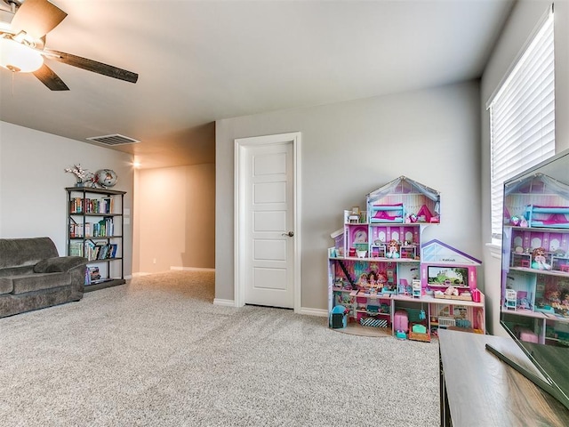 9212 NW 89th St, Yukon, OK 73099 - recreation room featuring carpet flooring, ceiling fan, and baseboards