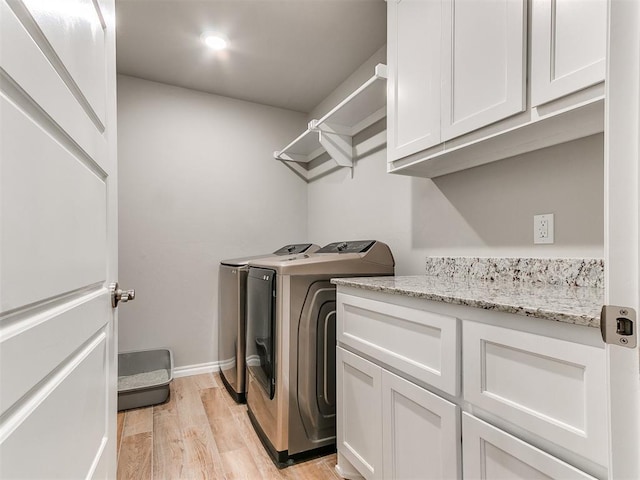 9212 NW 89th St, Yukon, OK 73099 - laundry area with independent washer and dryer, cabinet space, light wood-type flooring, baseboards, and recessed lighting