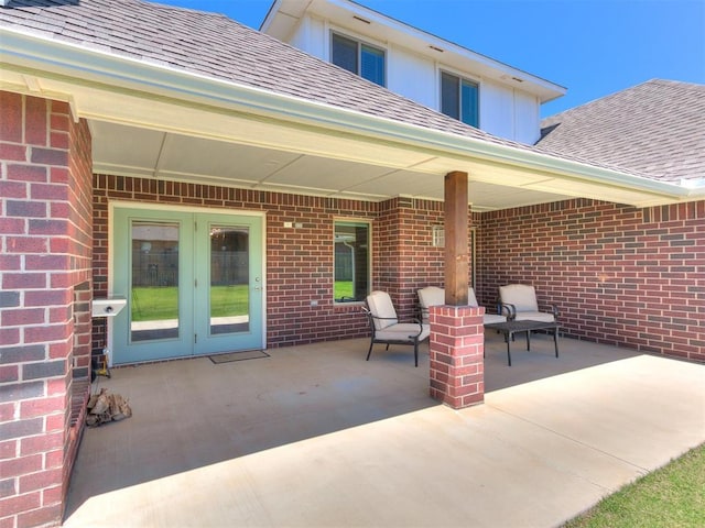 9212 NW 89th St, Yukon, OK 73099 - view of patio / terrace featuring french doors