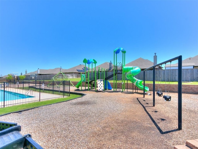 9212 NW 89th St, Yukon, OK 73099 - communal playground featuring a residential view