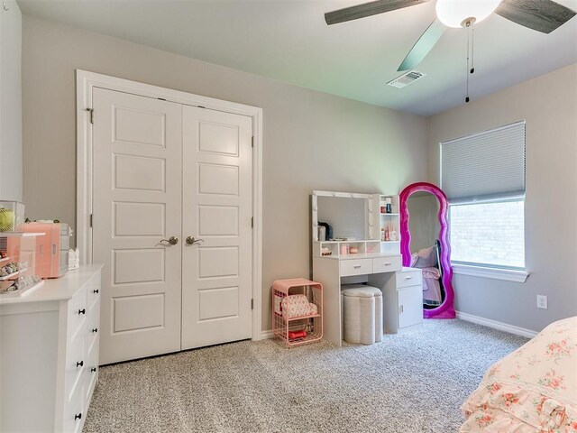 9212 NW 89th St, Yukon, OK 73099 - carpeted bedroom featuring baseboards, a closet, and a ceiling fan