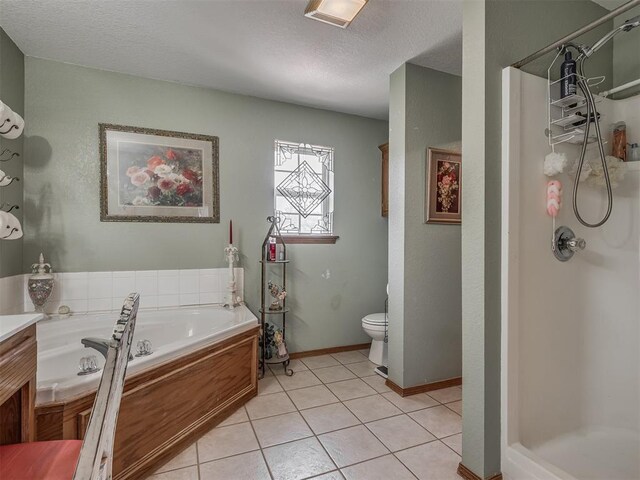 870756 S 3460th Rd, Chandler, OK 74834 - full bathroom with a shower stall, toilet, a garden tub, tile patterned flooring, and a textured ceiling
