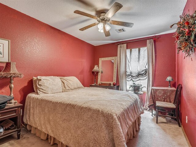 870756 S 3460th Rd, Chandler, OK 74834 - bedroom featuring light carpet, a textured wall, a textured ceiling, and a ceiling fan