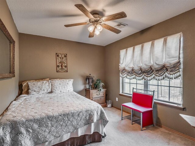 870756 S 3460th Rd, Chandler, OK 74834 - carpeted bedroom with baseboards and a ceiling fan