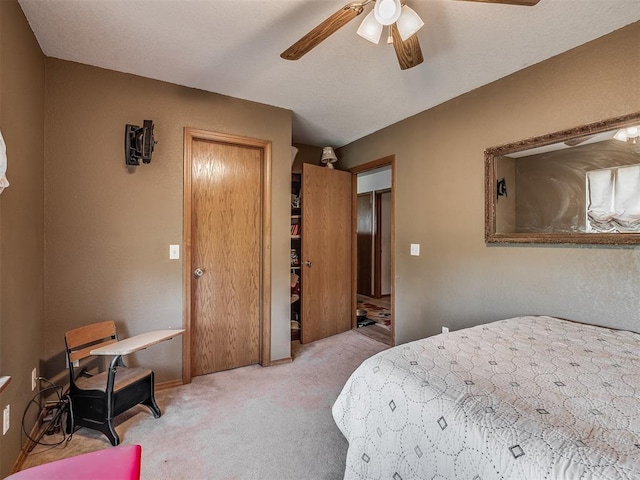 870756 S 3460th Rd, Chandler, OK 74834 - carpeted bedroom featuring a ceiling fan