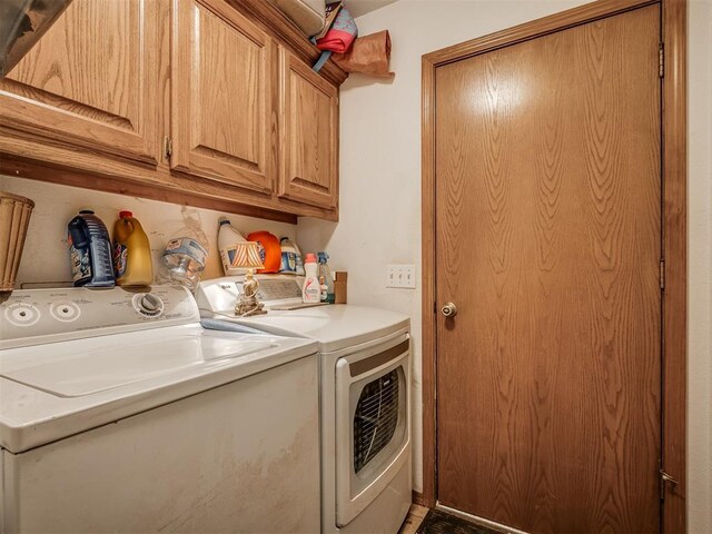 870756 S 3460th Rd, Chandler, OK 74834 - laundry area with washing machine and dryer and cabinet space