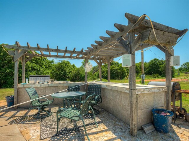 870756 S 3460th Rd, Chandler, OK 74834 - view of patio featuring area for grilling and a pergola